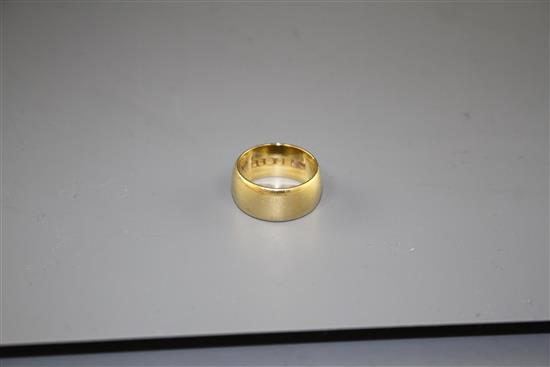 A 1970s 18ct gold wedding band, size M, 11.1 grams,